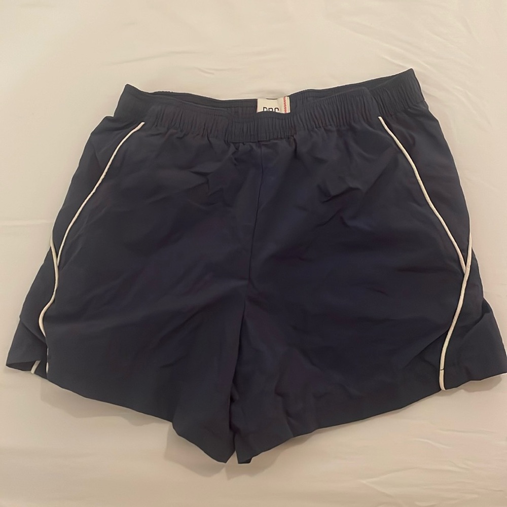 navy blue bdg (urban outfitters) parachute shorts.